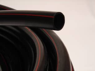 Thumbnail of the 1 1/4"x100' PE 75 PSI(RED STRIPE) CSA PIPE WITH THE STRIPE