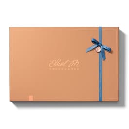 Mix and Match chocolate pieces with our reimagined packaging with complementing colored satin ribbons and charm sealed with Ethel M&#39;s monogram.