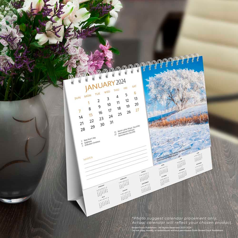 Canadian Geographic Scenic 2024 Easel Calendar on a desk