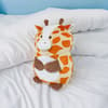 image Kobioto Giraffe Supersoft Plush  on a bed