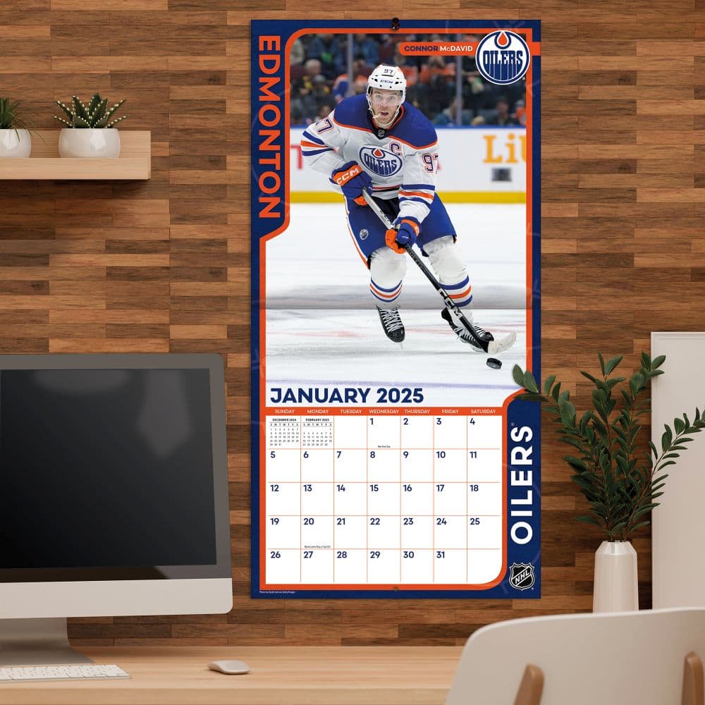 NHL Edmonton Oilers 2025 Wall Calendar on a wall