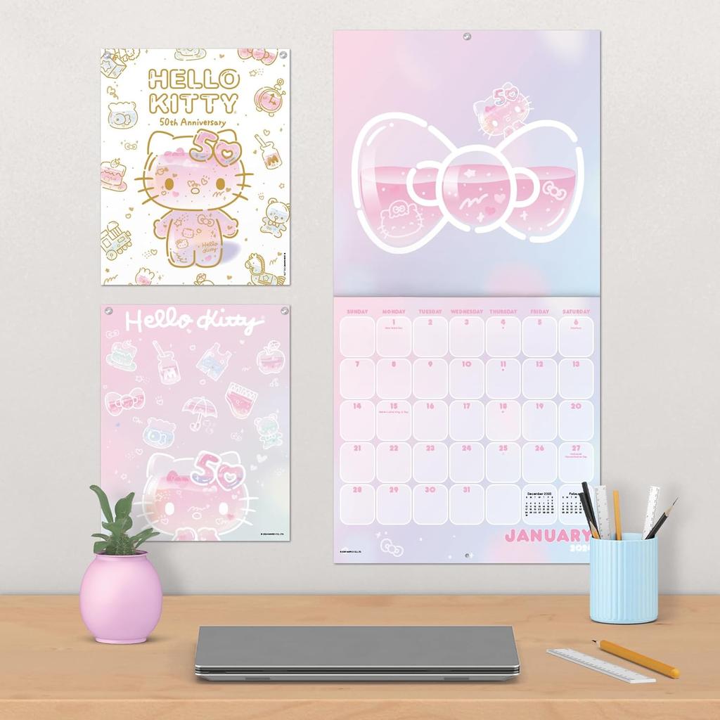 Hello Kitty 50 Year Collectors Edition 2024 Wall Calendar on a wall