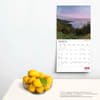 image Canadian Wilderness 2024 Wall Calendar on a wall