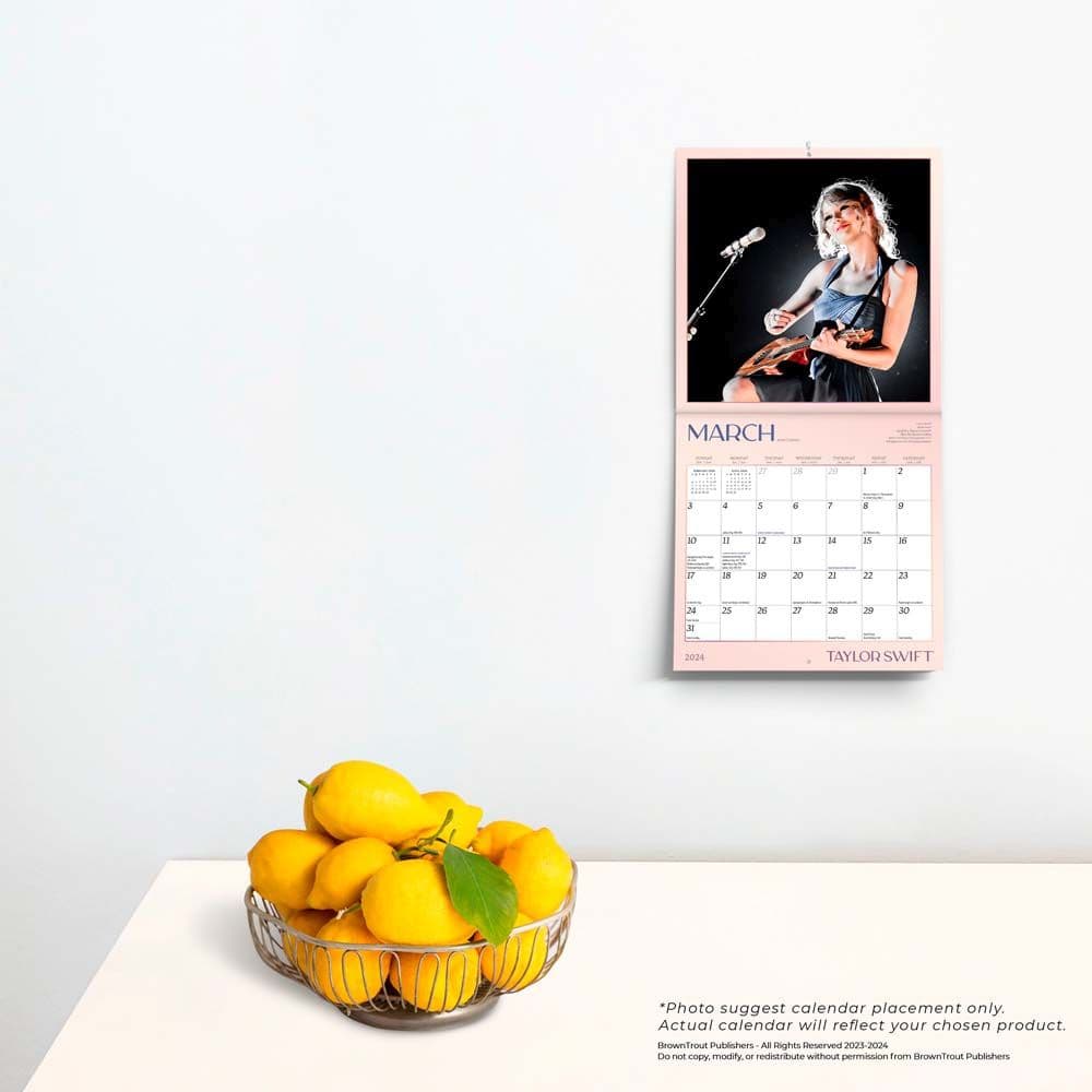 Taylor Swift 2024 Mini Wall Calendar on a wall
