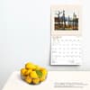 image Group of Seven AGO 2024 Wall Calendar on a wall