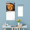 image Foodie Adventures 2025 Wall Calendar on a wall