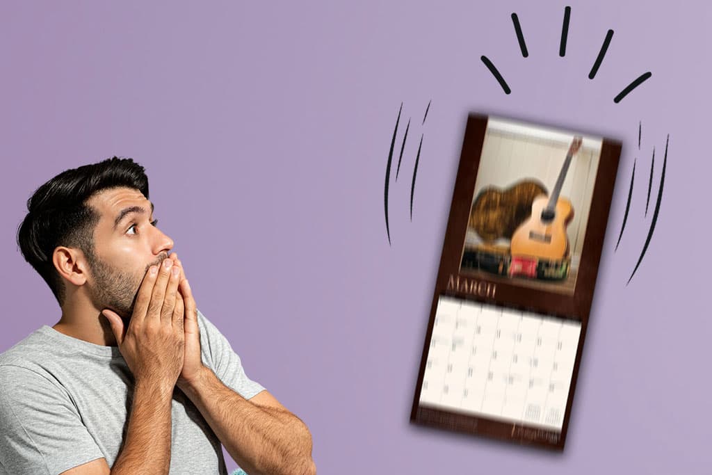 Wall calendar that has fallen off the wall and landed on the floor